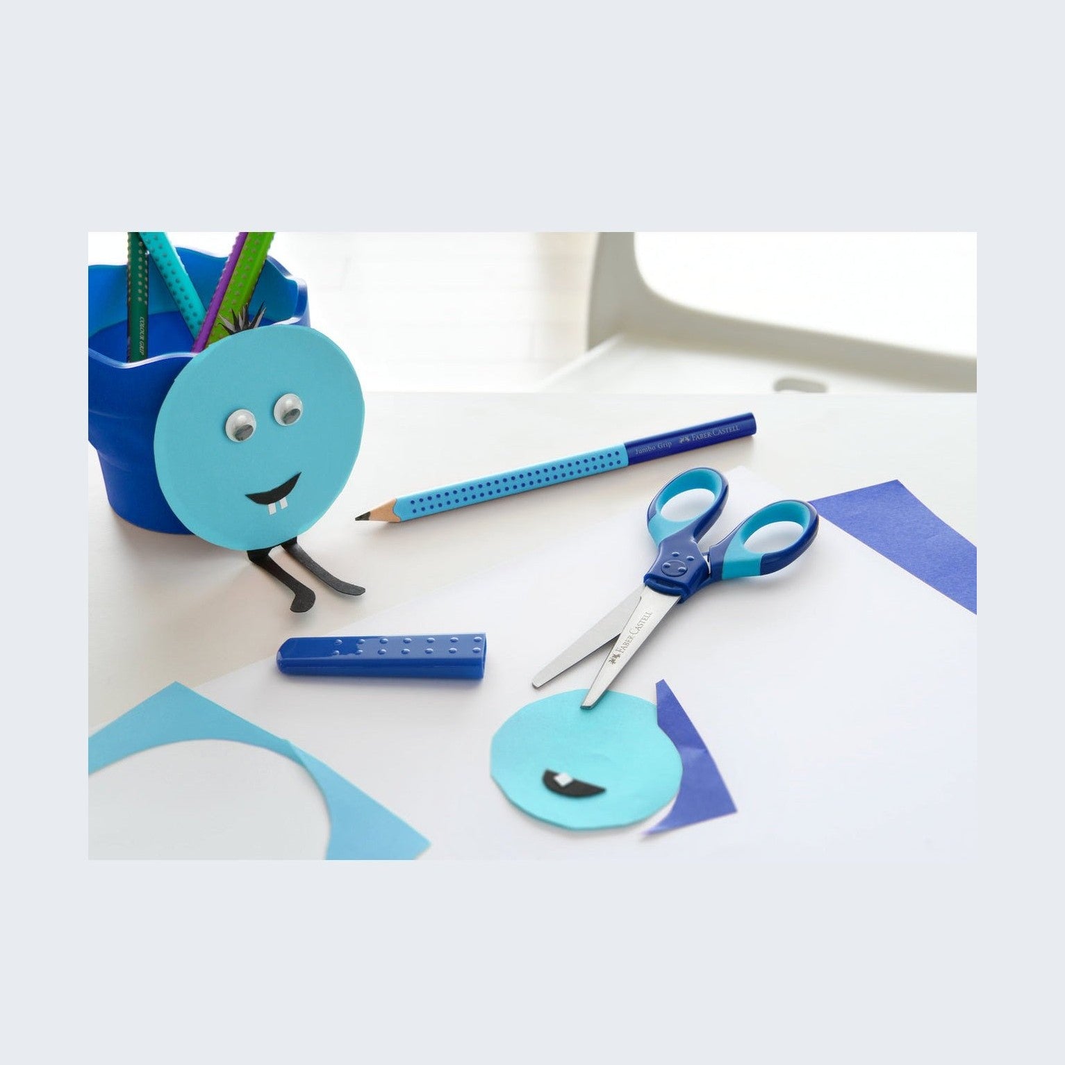 Tesoura Faber-Castell Grip com proteção L+R Azul - Papelaria Encantada